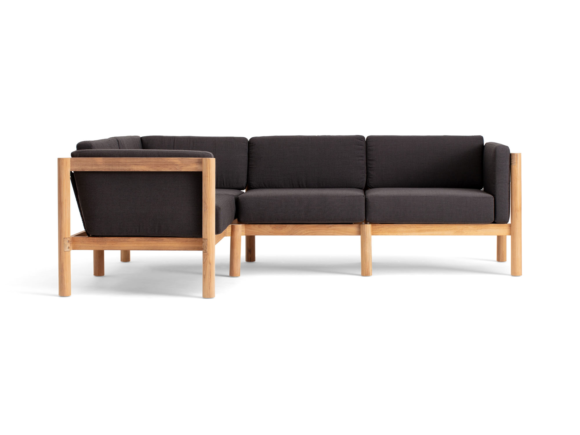 Front view of 4-piece outdoor sectional with black arm cushions